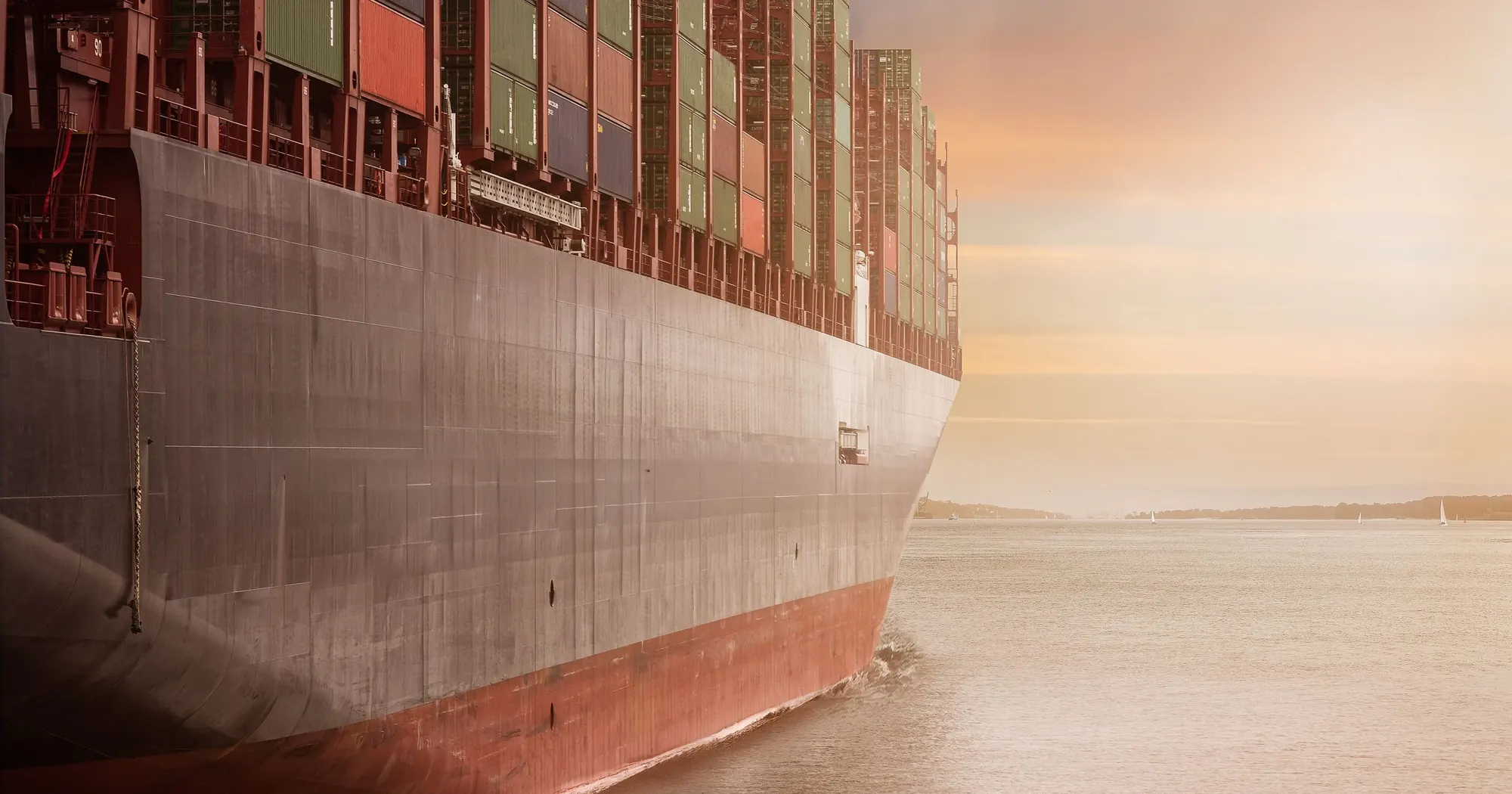 Cargo ship at sunset